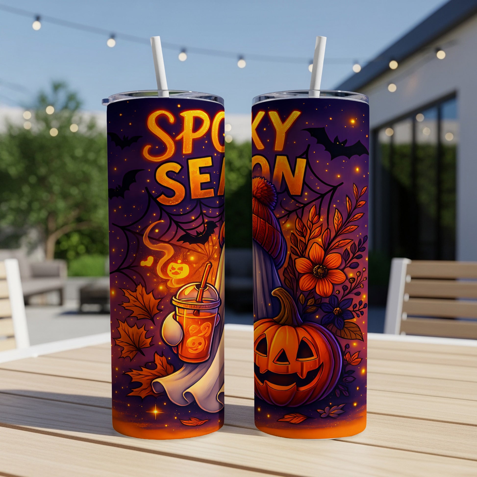 Two tumblers with a "Spooky Season" Halloween design featuring pumpkins, bats, and a ghost.