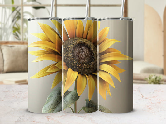 Three tumblers featuring a large sunflower with detailed petals and leaves.