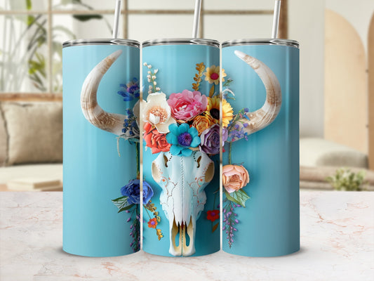 Bull skull adorned with colorful flowers on a blue background.