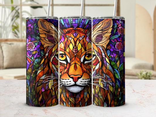 Stained glass bobcat tumbler with colorful floral accents.