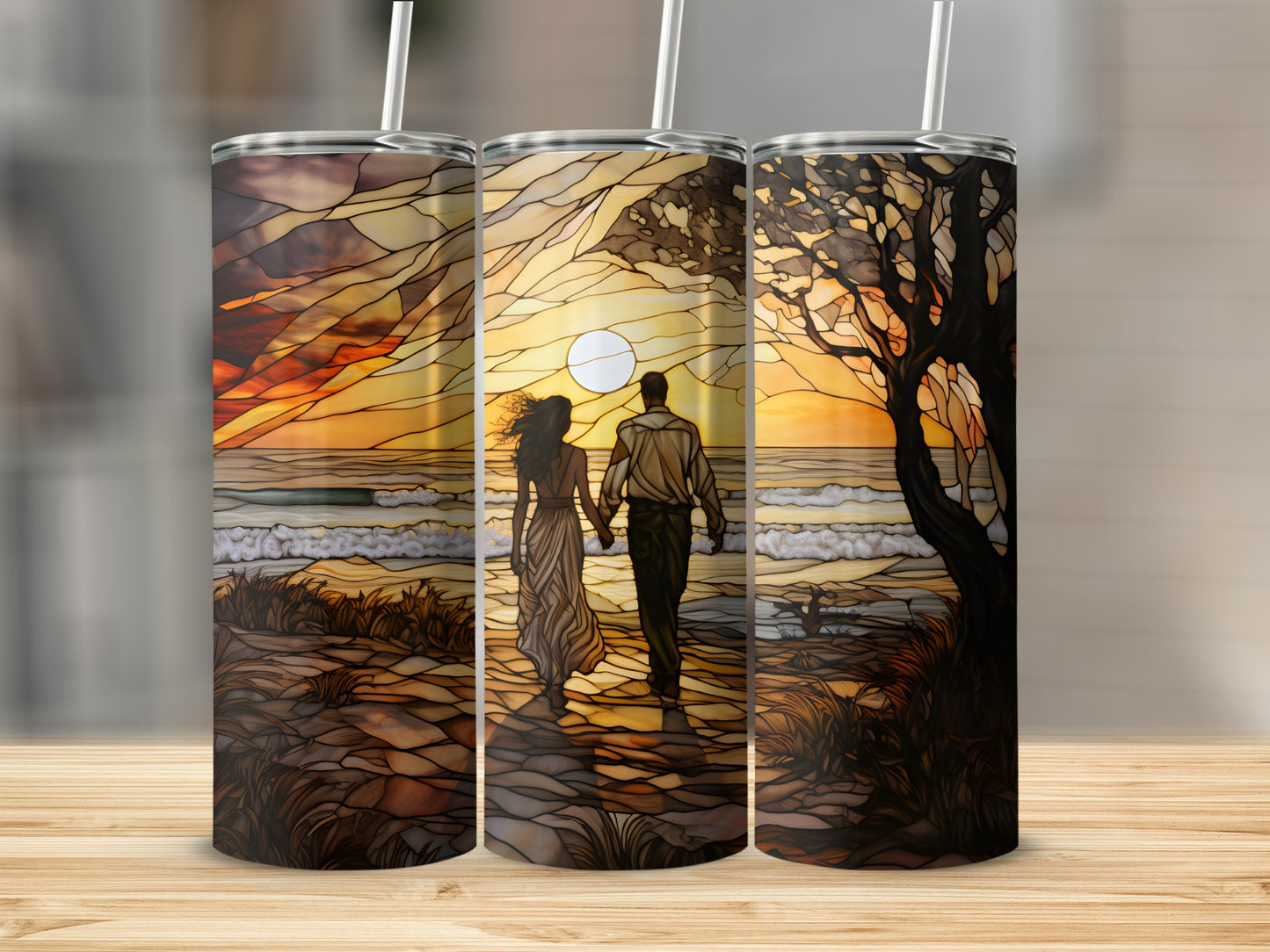 Couple holding hands on beach at sunset, stained glass art design on tumblers.