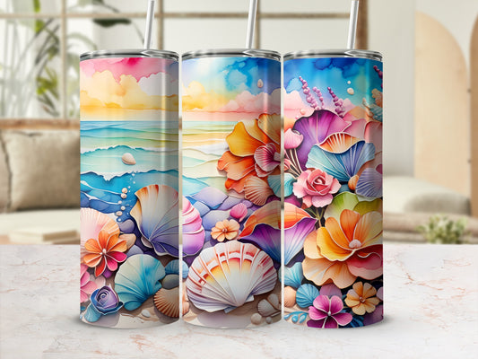 Three colorful tumblers with seashell and floral beach scene designs.