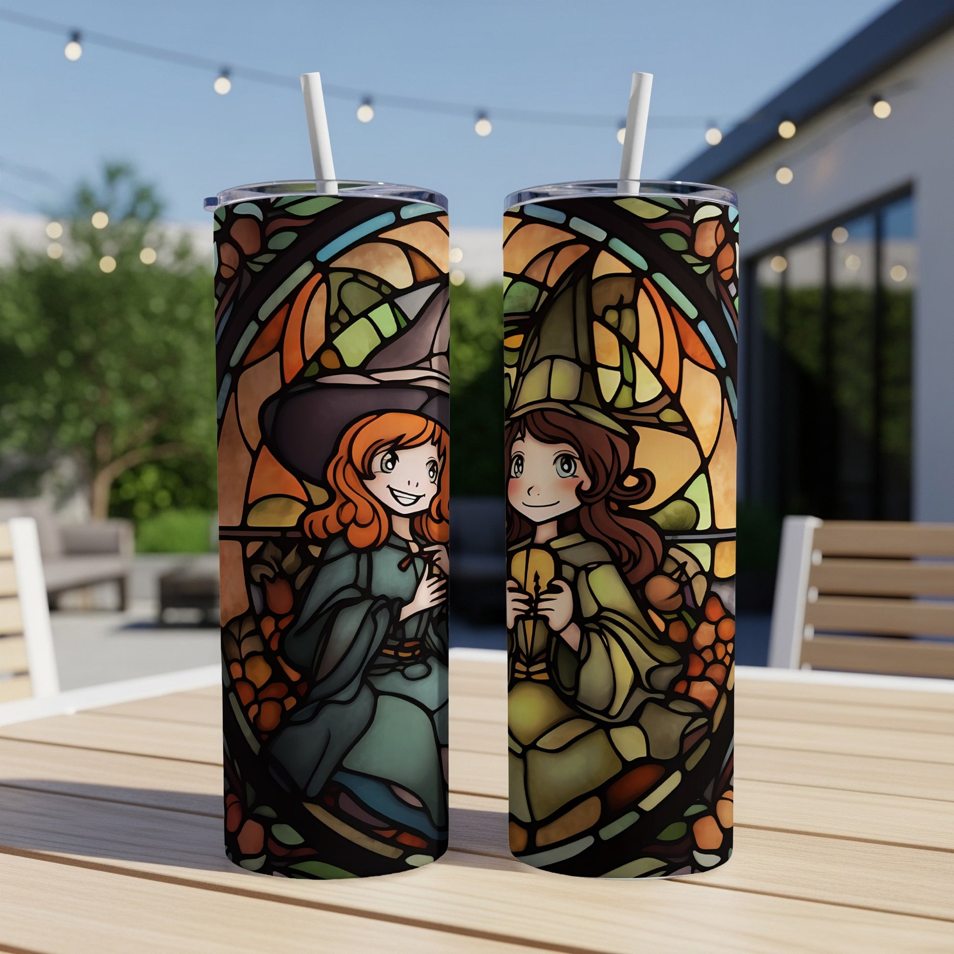 Two witch characters in stained glass style on a tumbler with straws.