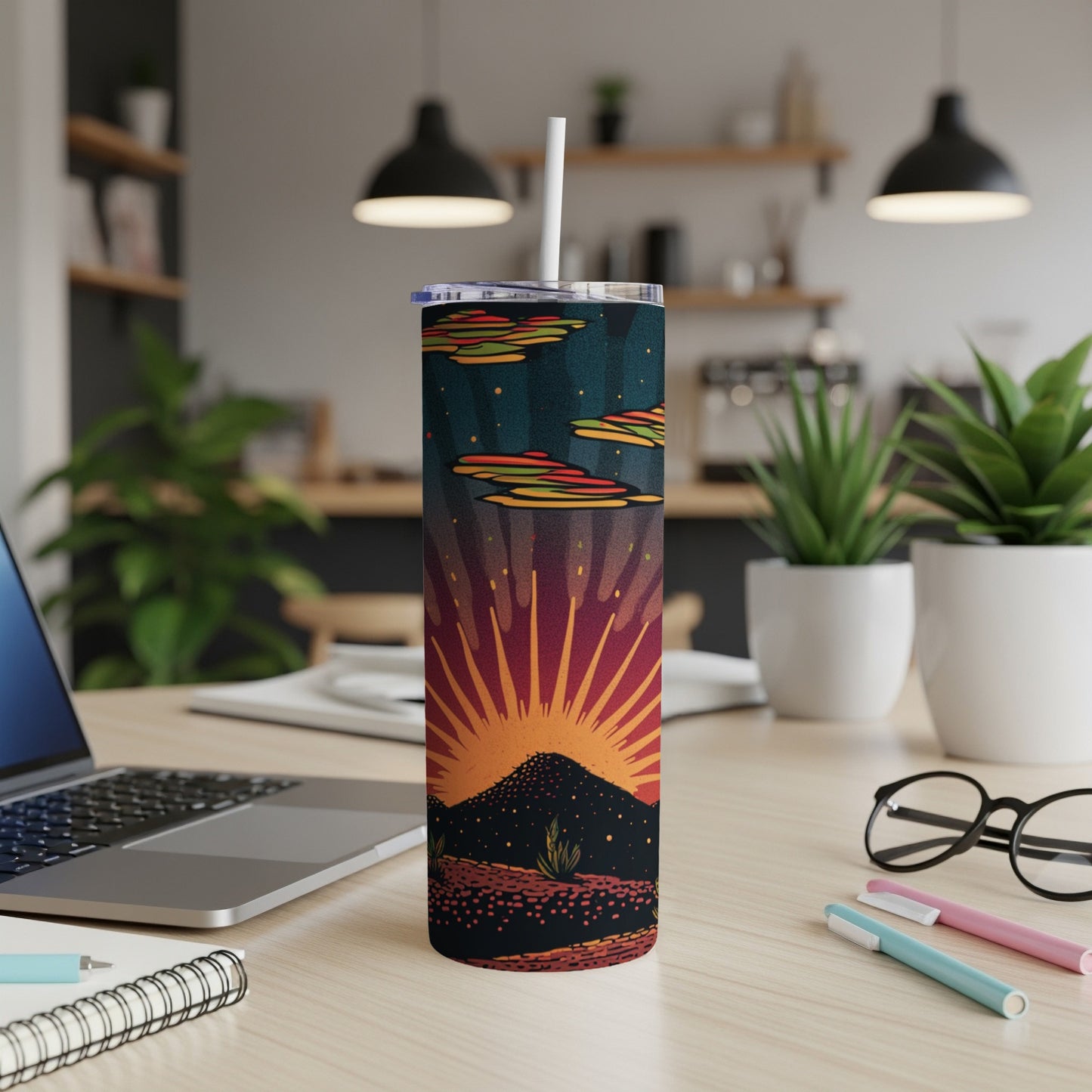 Tumbler with sunset mountains and starry night sky design.