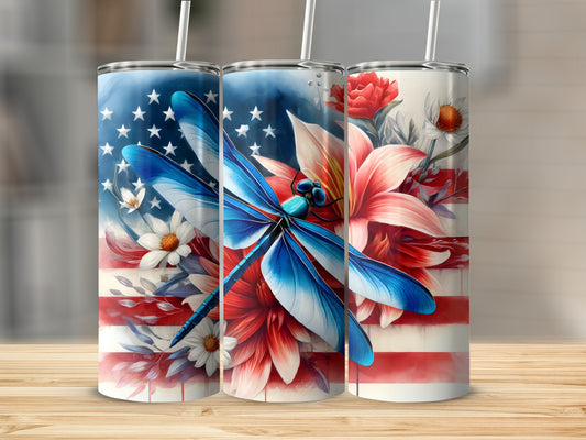 Tumbler with patriotic flag, dragonfly, and floral design.