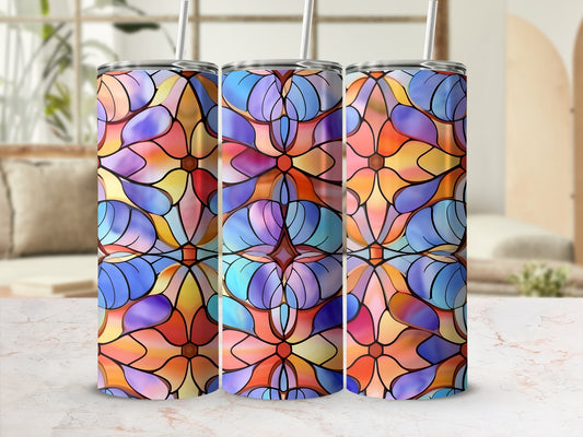 Three stained-glass tumblers with floral patterns in warm and cool colors.