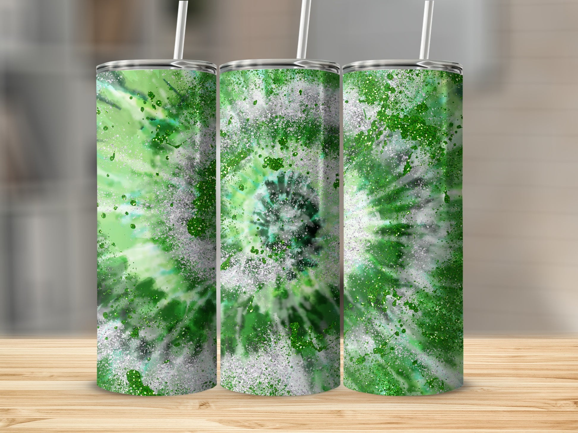 Three tumblers with a green and silver tie-dye splatter design.