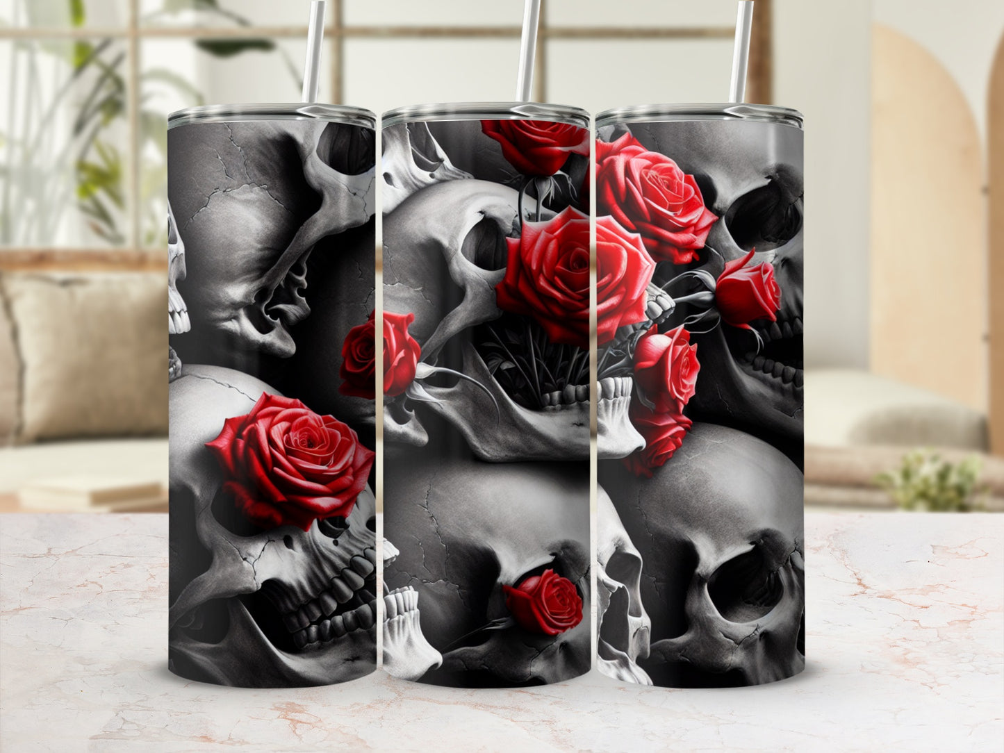 Skulls and red roses design on a stainless steel tumbler.