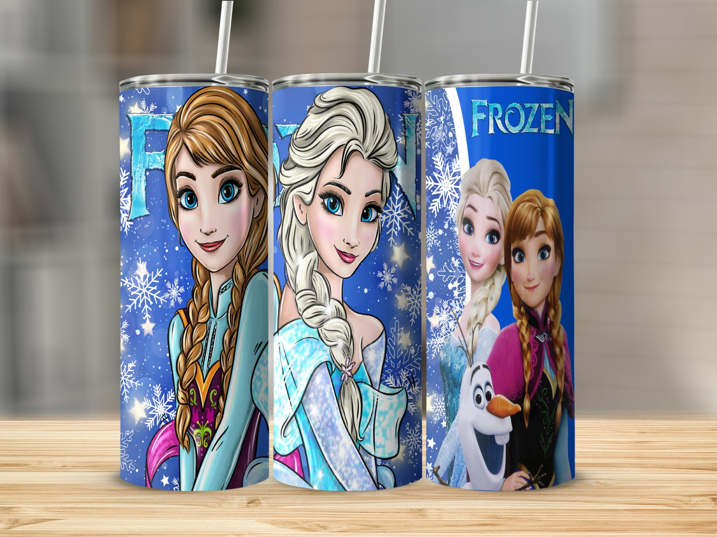 Three Frozen-themed tumblers with Elsa, Anna, and Olaf on blue, snowy backgrounds.