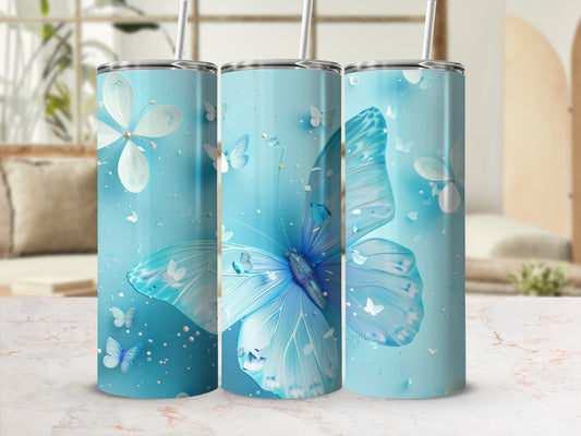 Blue butterfly tumbler with scattered butterflies and glitter.