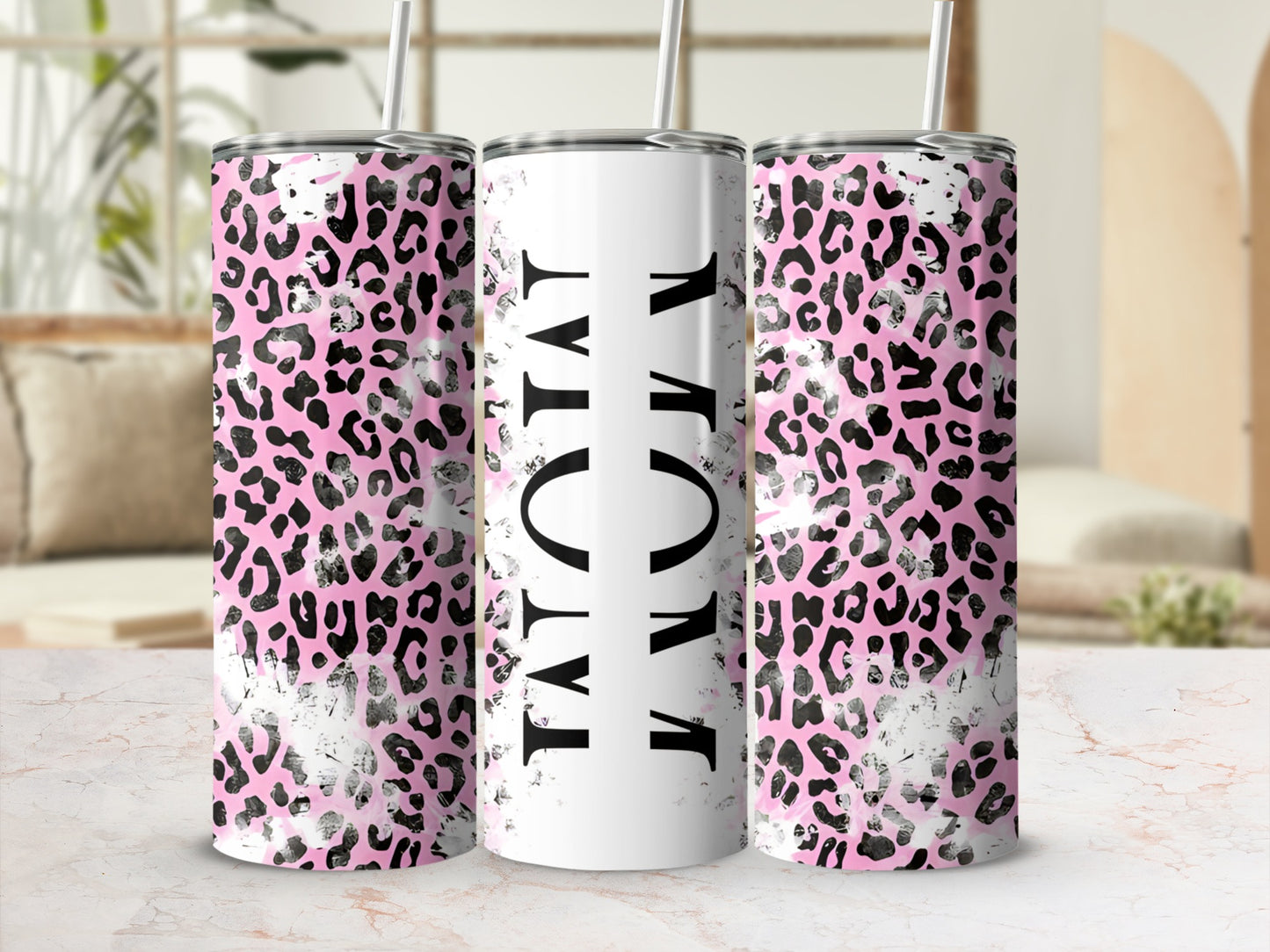 Pink leopard print tumbler with "MOM" in black letters.