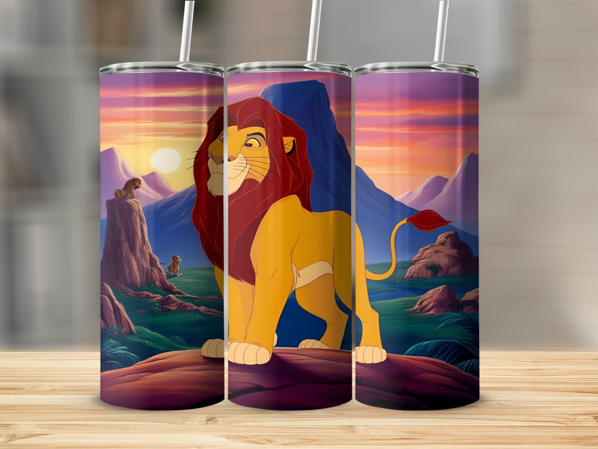 The Lion King characters Simba and Mufasa on a vibrant sunset landscape tumbler.