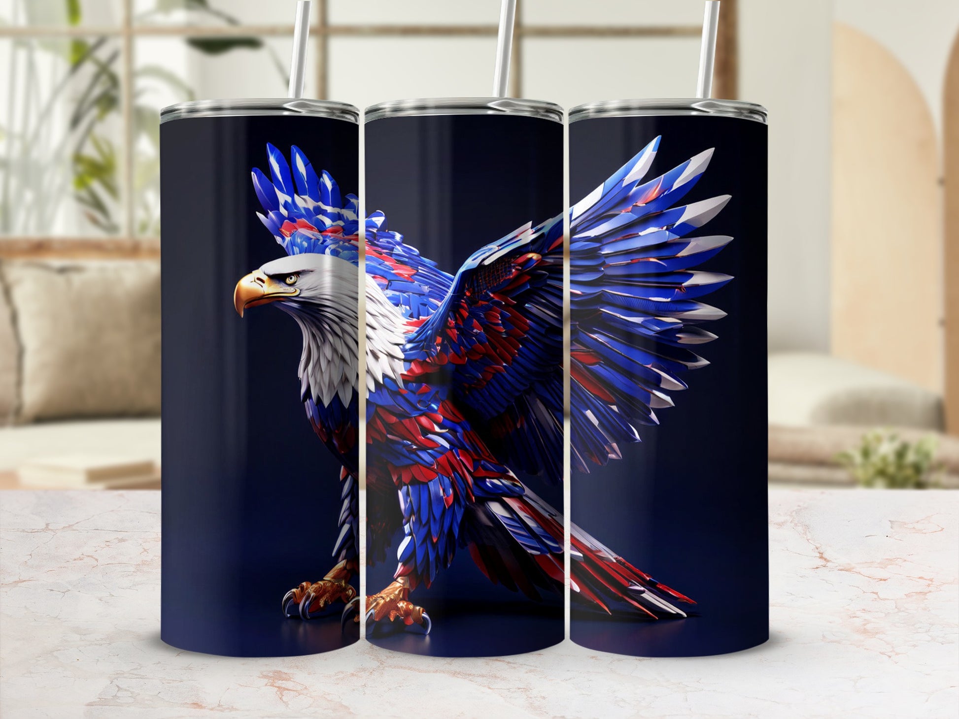 Eagle design on three dark blue tumblers with straws.