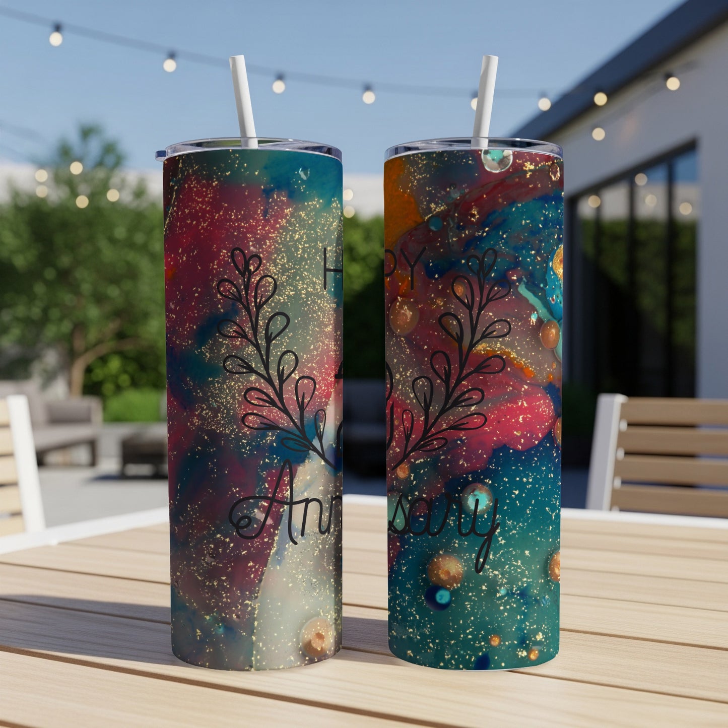 Two tumblers with a colorful marble design and "Happy Anniversary" text.