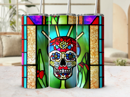Stained glass skull tumbler with colorful floral accents.