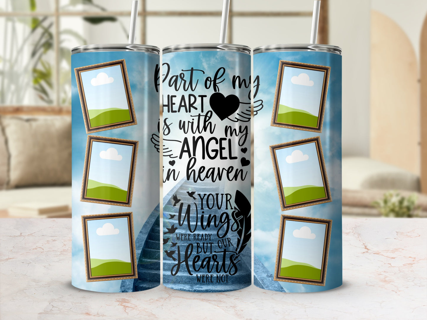 Tumbler with "Part of my heart is with my angel in heaven" and winged hearts.