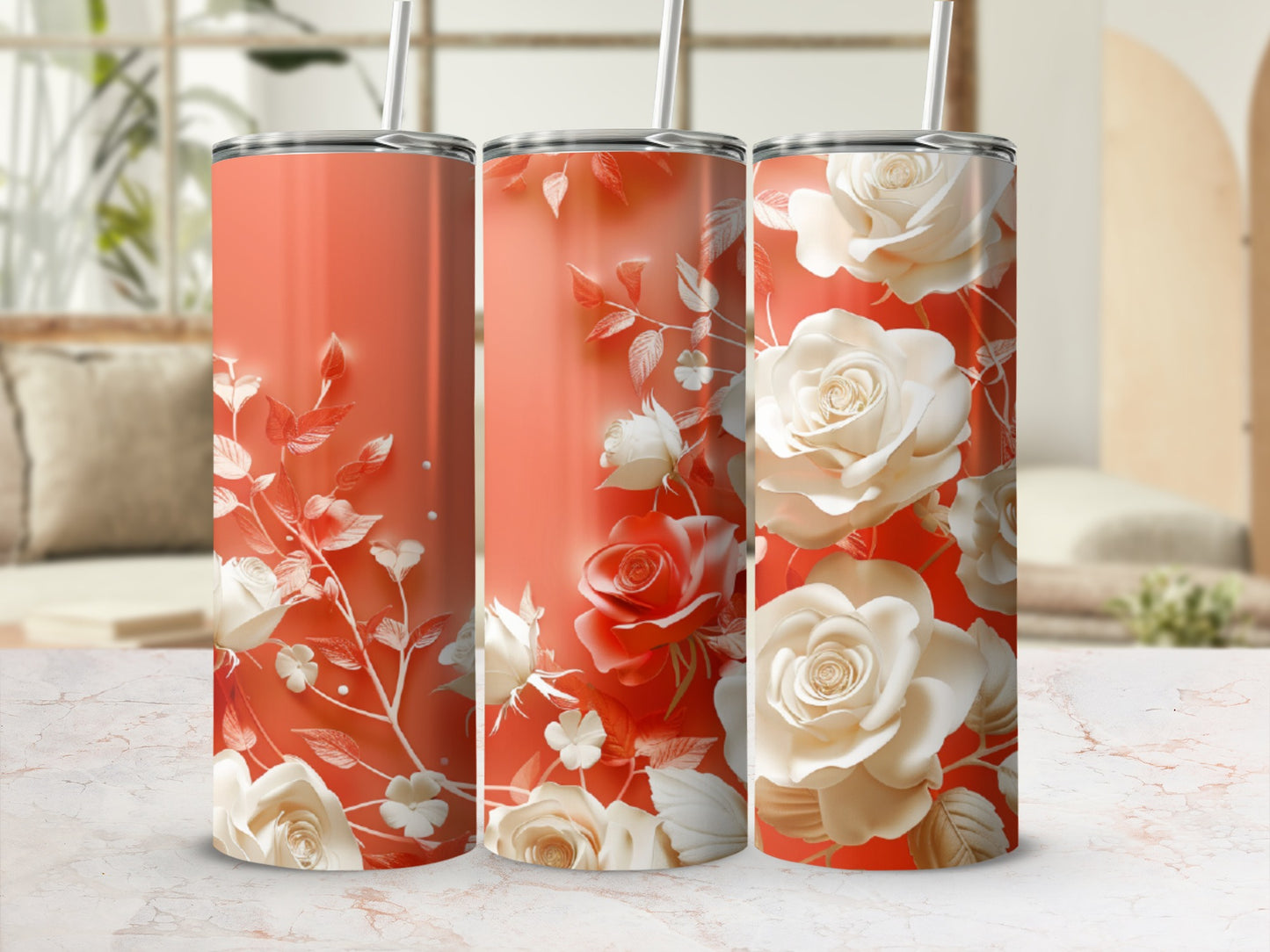 Three coral tumblers with white roses and floral accents.