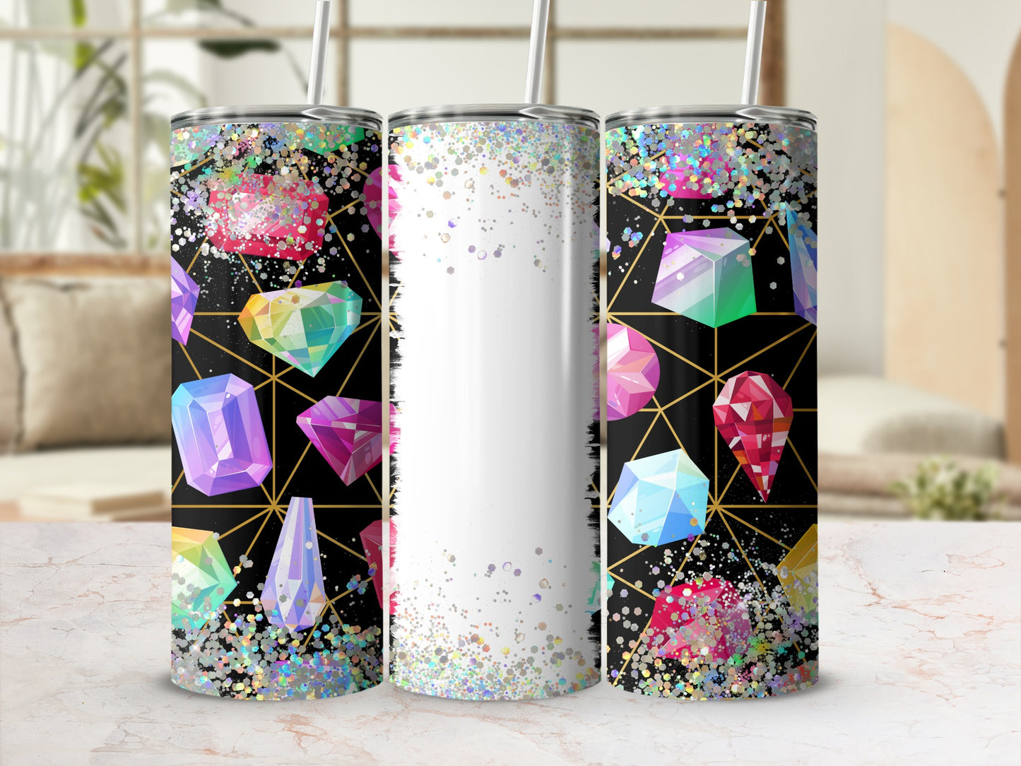 Three tumblers with colorful gemstones and glitter on a black geometric background.
