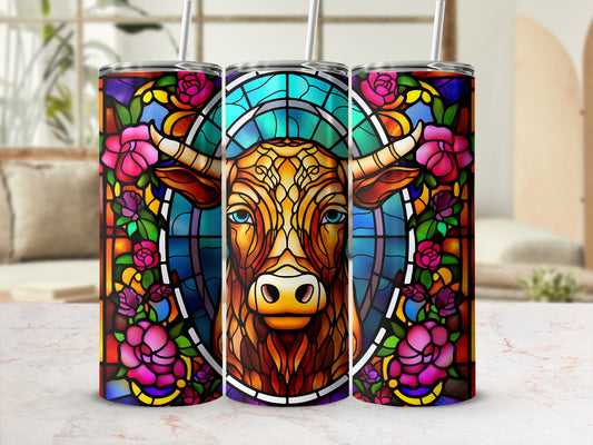 Stained glass tumbler with bull head and floral border.