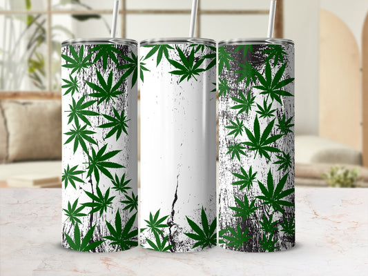 Green marijuana leaves scattered across three white and black distressed tumblers.