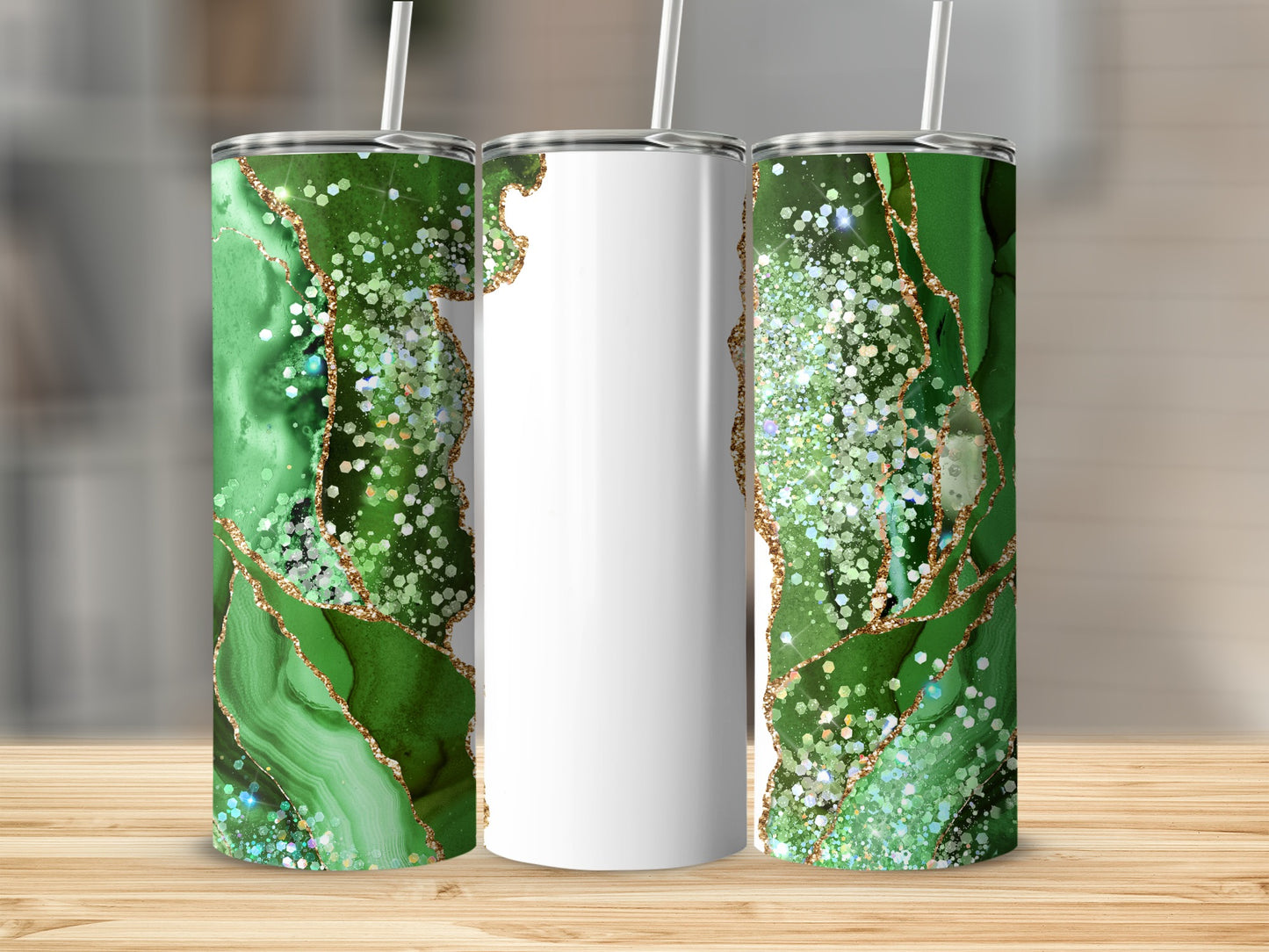 Three tumblers with green marble and glitter design, one with a white section.