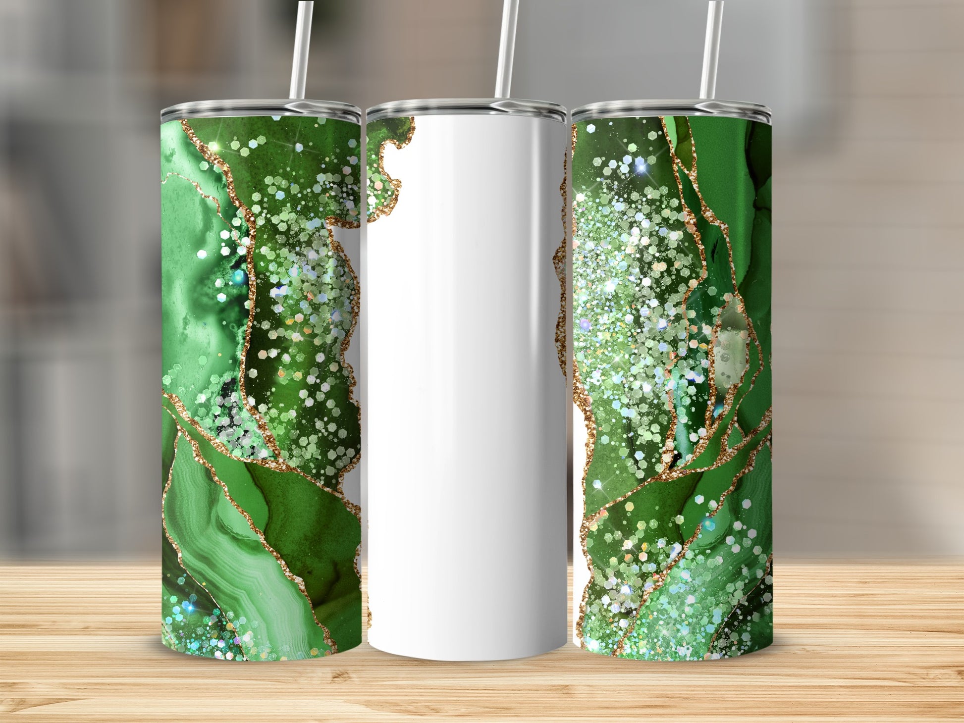 Three tumblers with green marble and glitter design, one with a white section.