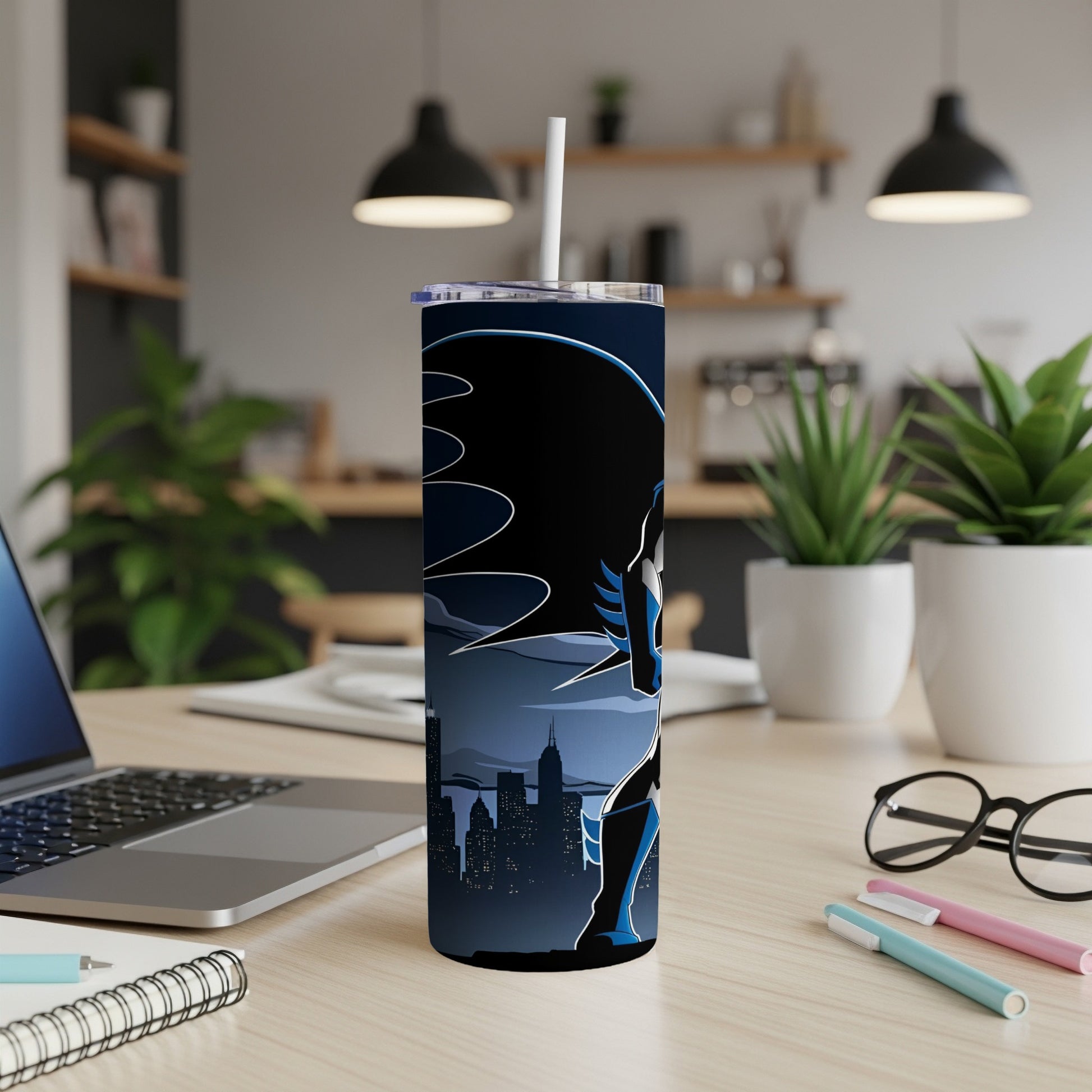 Tall blue tumbler featuring Batman silhouette against a city skyline.