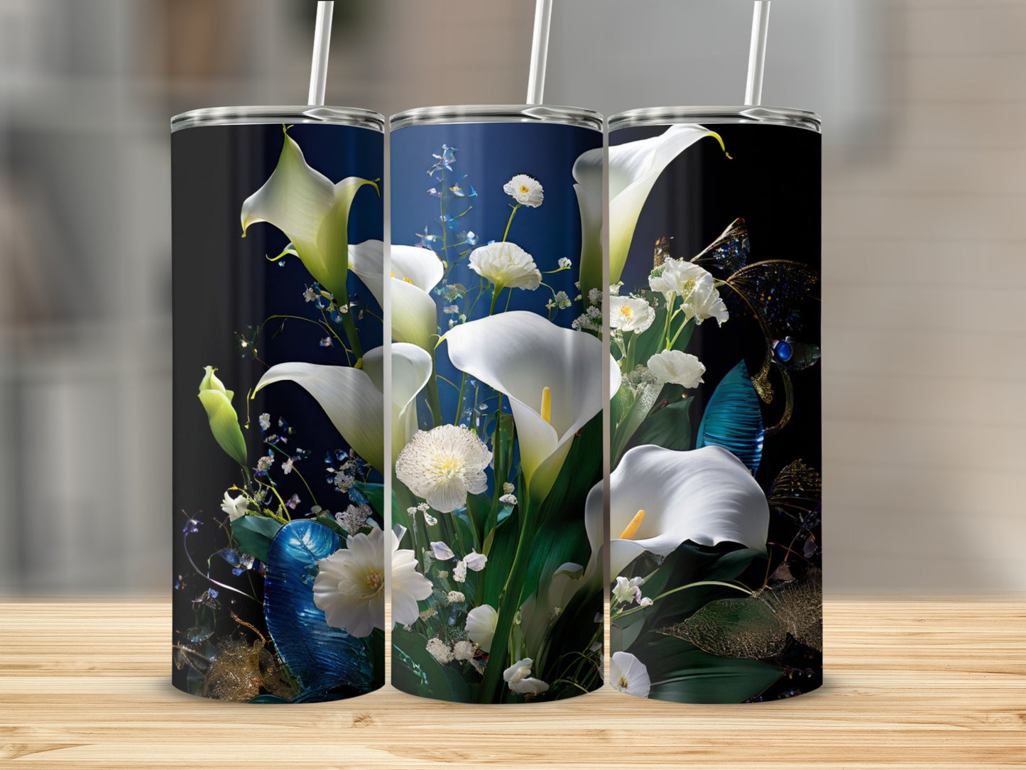 Three tumblers with white calla lilies and dark floral accents.