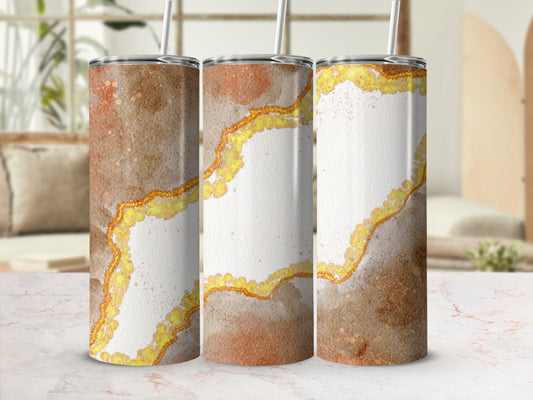 Three tumblers with glitter and marbled brown and gold design.