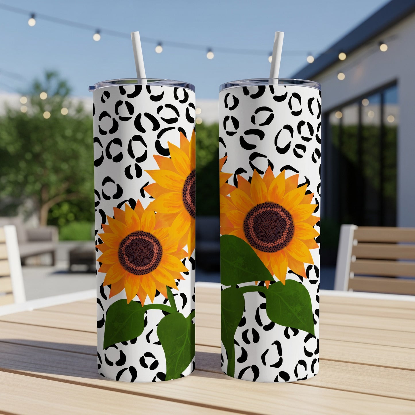 Two tumblers with sunflowers and black leopard print pattern.