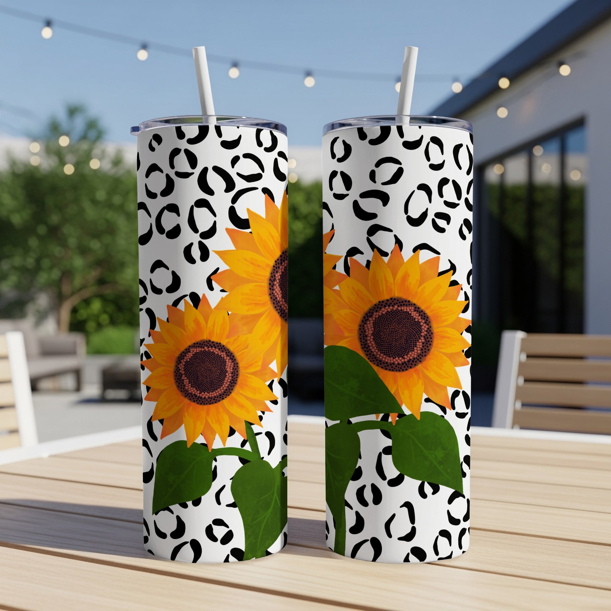 Two tumblers with sunflowers and black leopard print pattern.