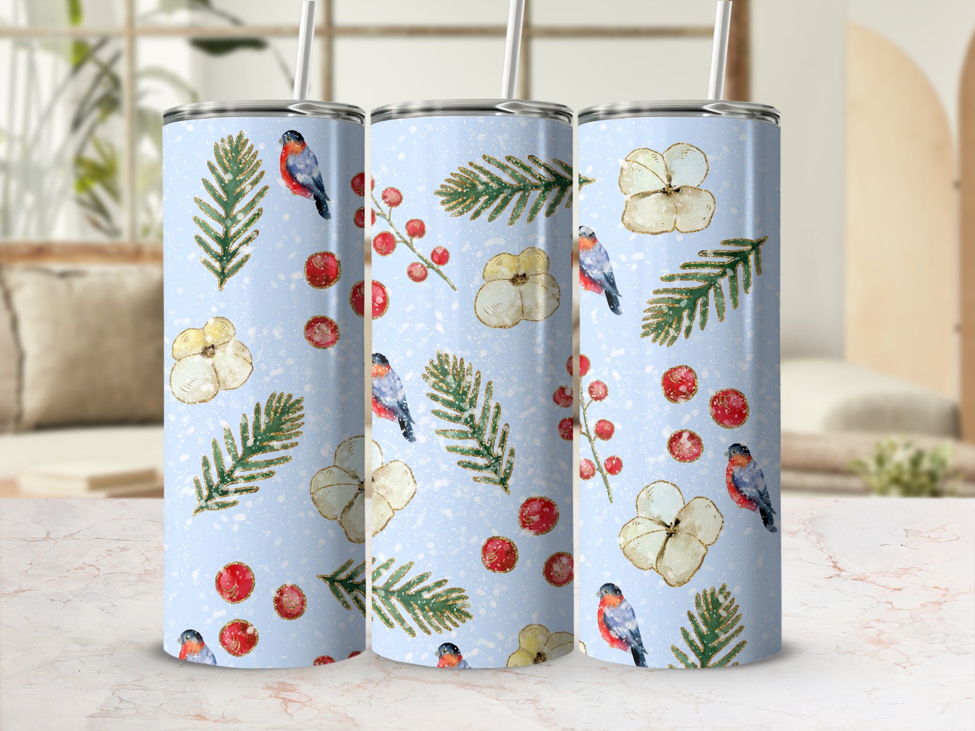 Three tall, slender tumblers with a winter bird and floral design.