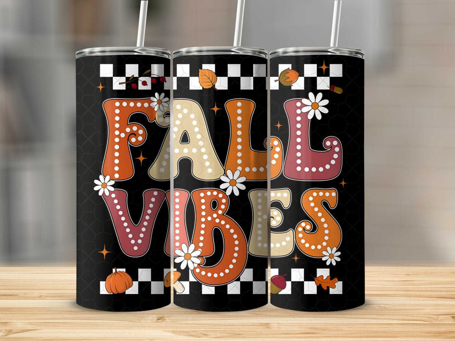 Fall Vibes tumbler with checkered pattern and floral accents.