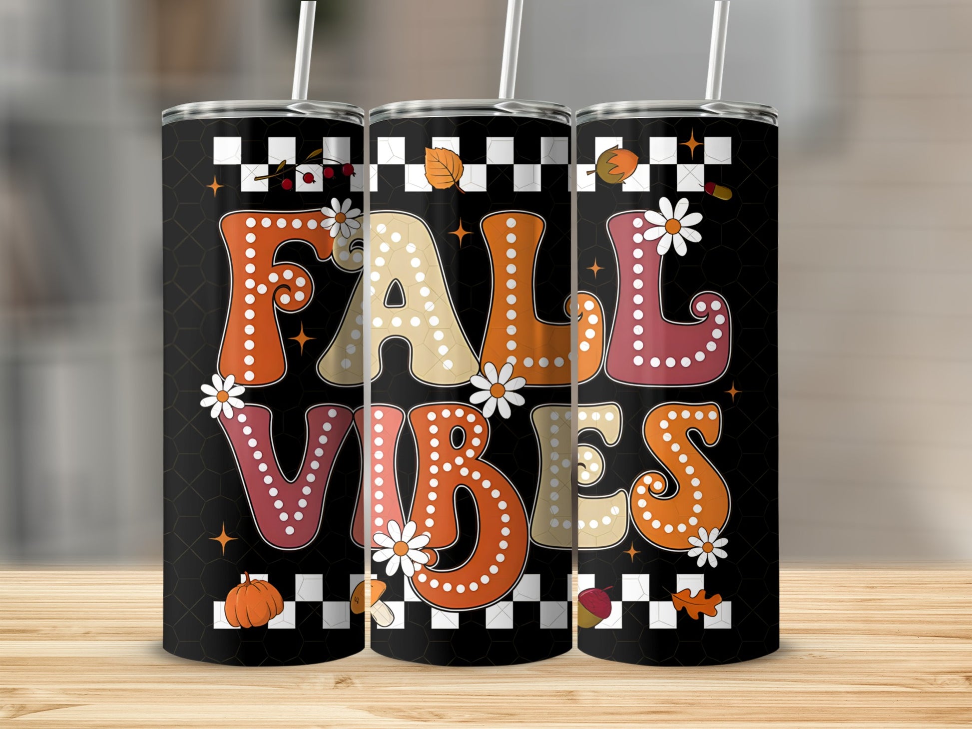 Fall Vibes tumbler with checkered pattern and floral accents.