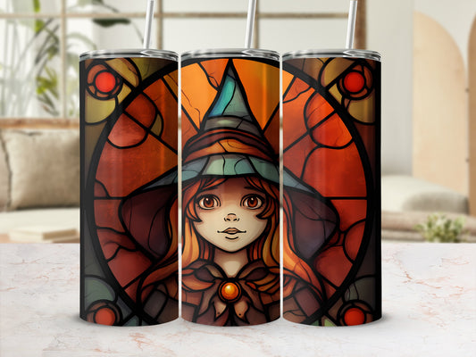 Stained glass tumbler with witch illustration.