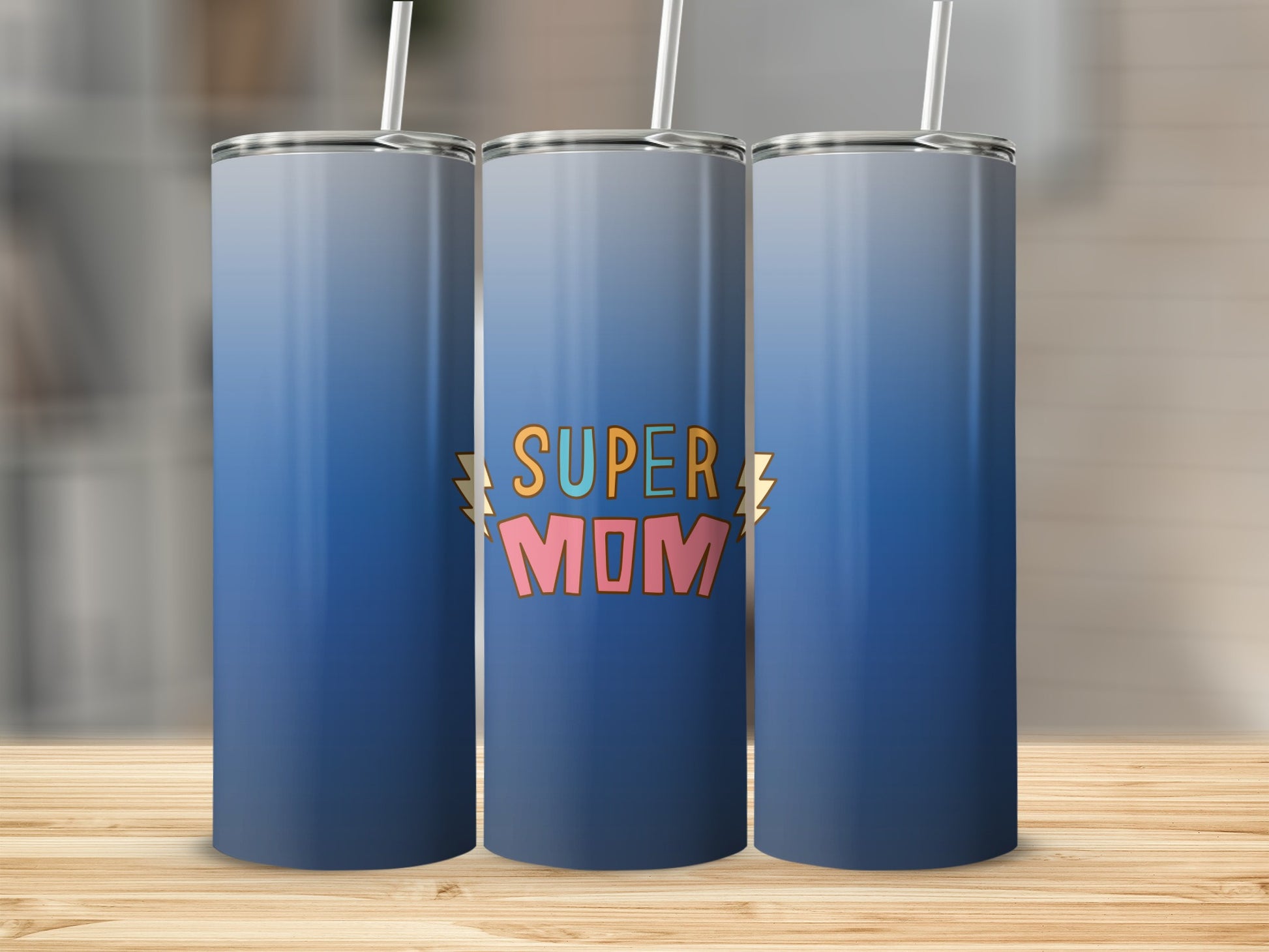 Blue gradient tumbler with "SUPER MOM" text and lightning bolt graphics.