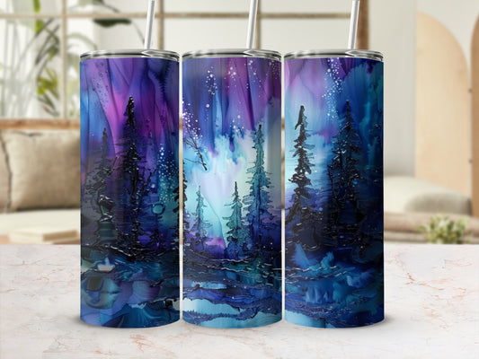 Three tumblers with a dark blue, purple, and teal starry forest design.