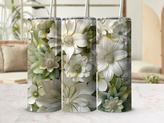 Floral pattern tumblers with straws on marbled surface.