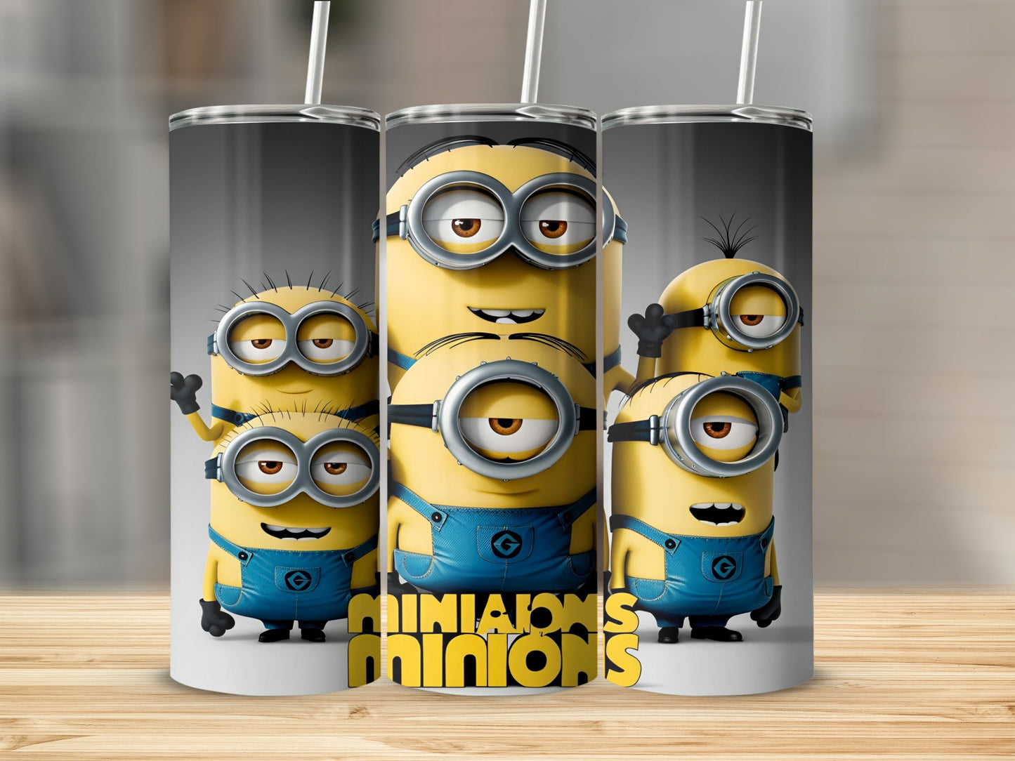 Trio of Minions characters on a tumbler with straw.