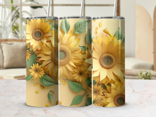 Three tall tumblers with a vibrant sunflower and green leaf pattern.