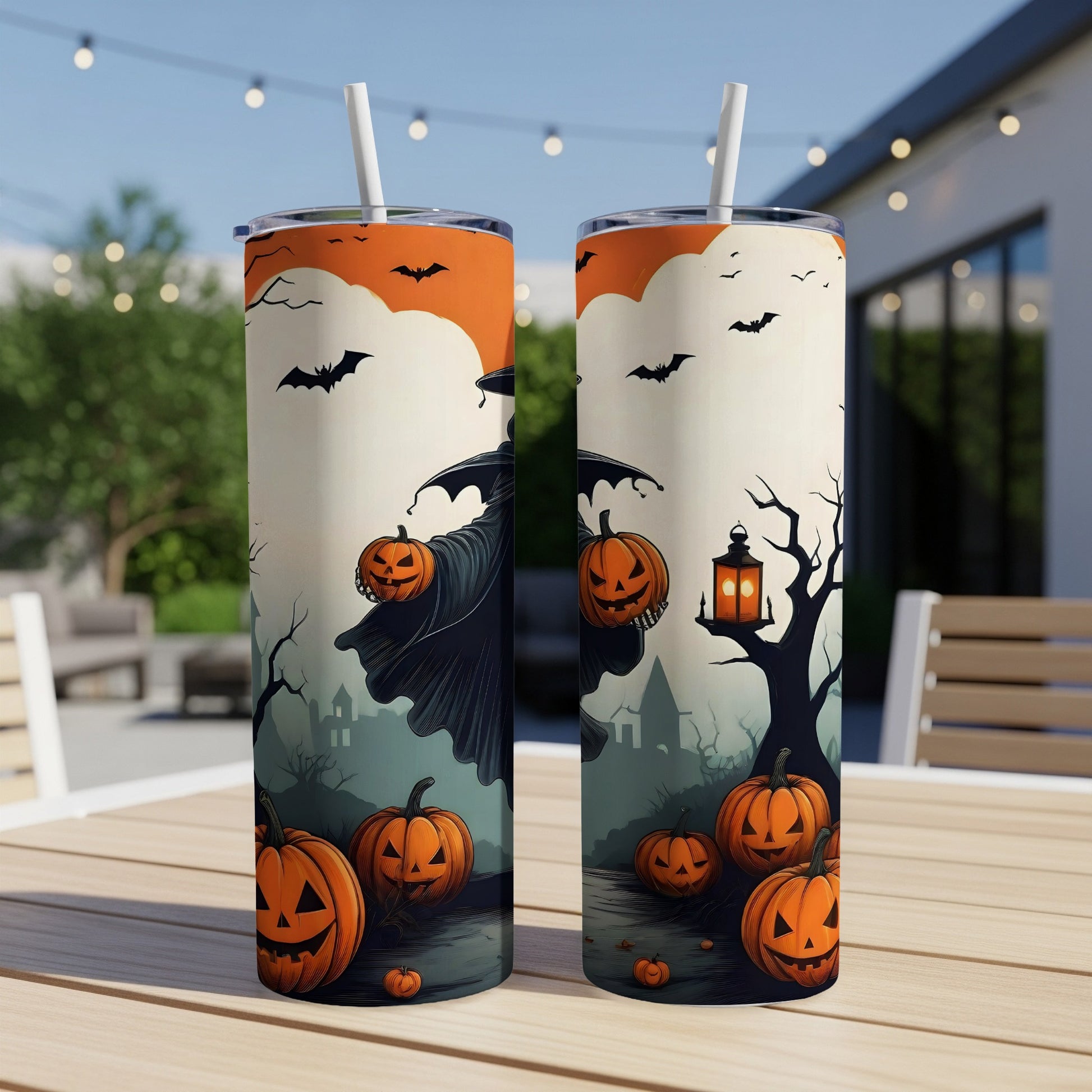 Two Halloween-themed tumblers with pumpkins, bats, and a witch design.