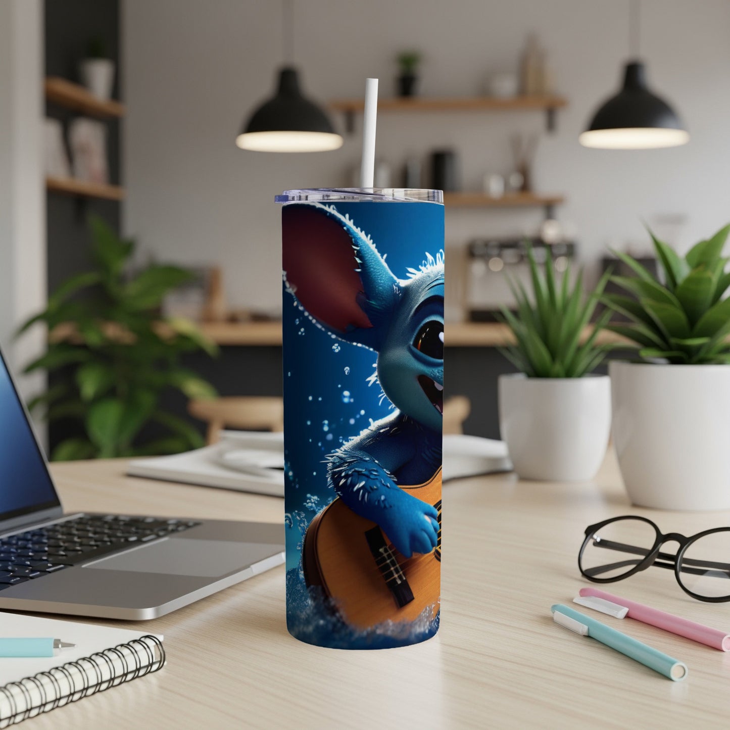 Stitch character on a blue tumbler with a guitar and straw.