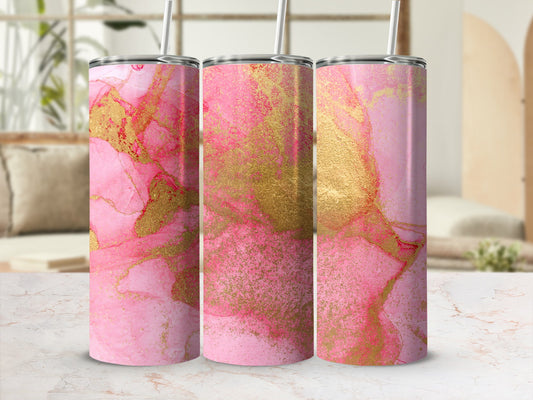 Three pink and gold abstract alcohol ink tumblers with straws.