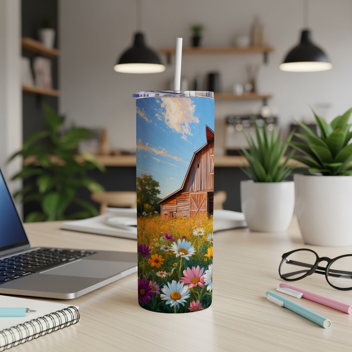 Barn and wildflowers on a tumbler with a straw.