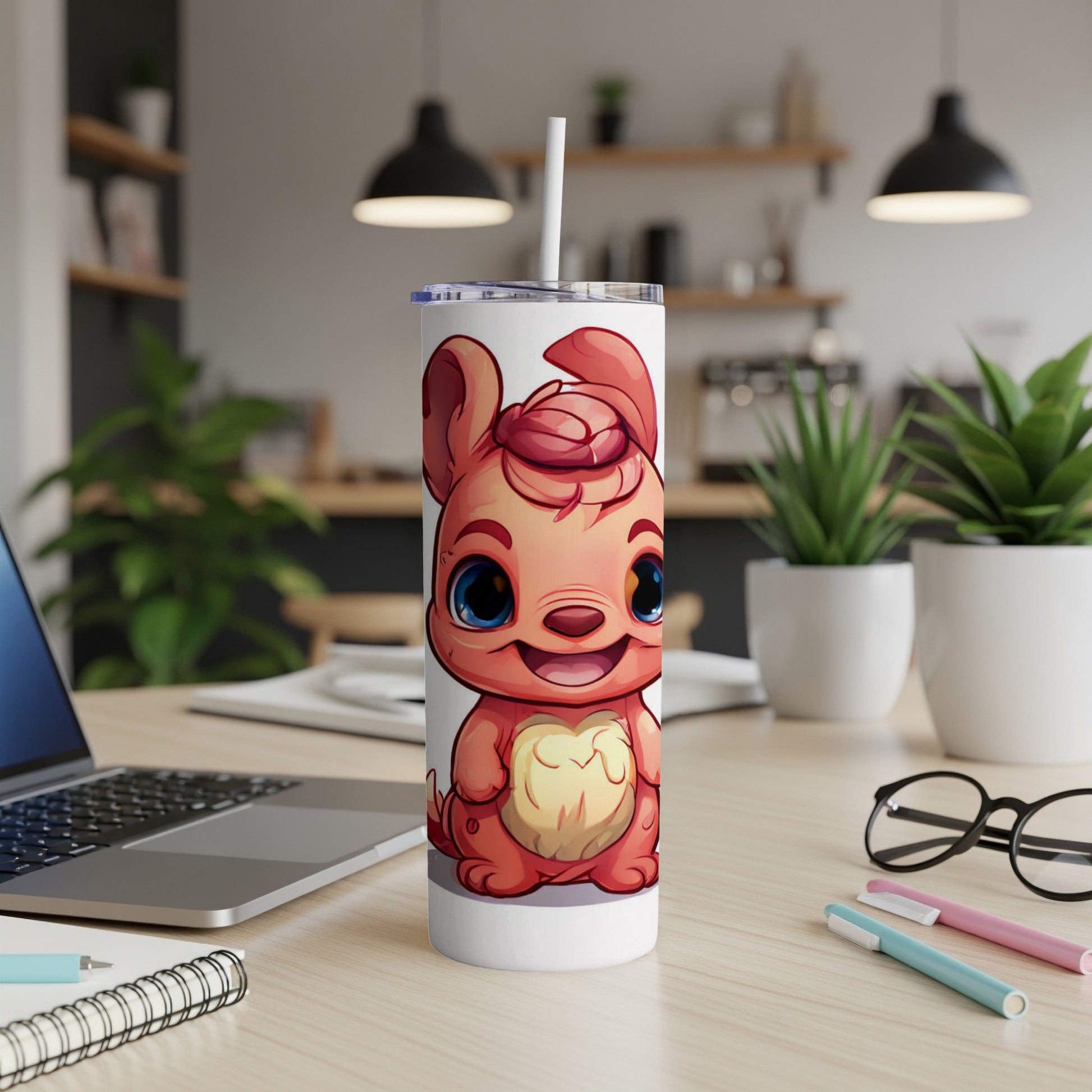 Cartoon dog with blue eyes on a white tumbler with a straw.
