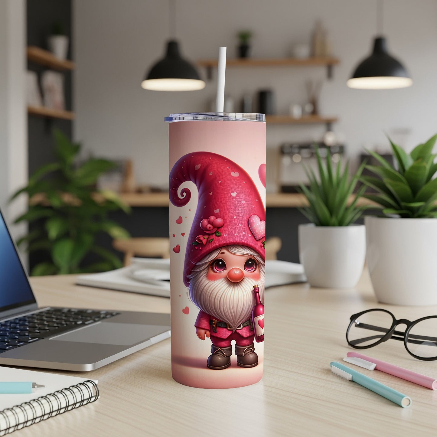 Pink gnome with hearts holding a bottle on a tumbler with a straw.