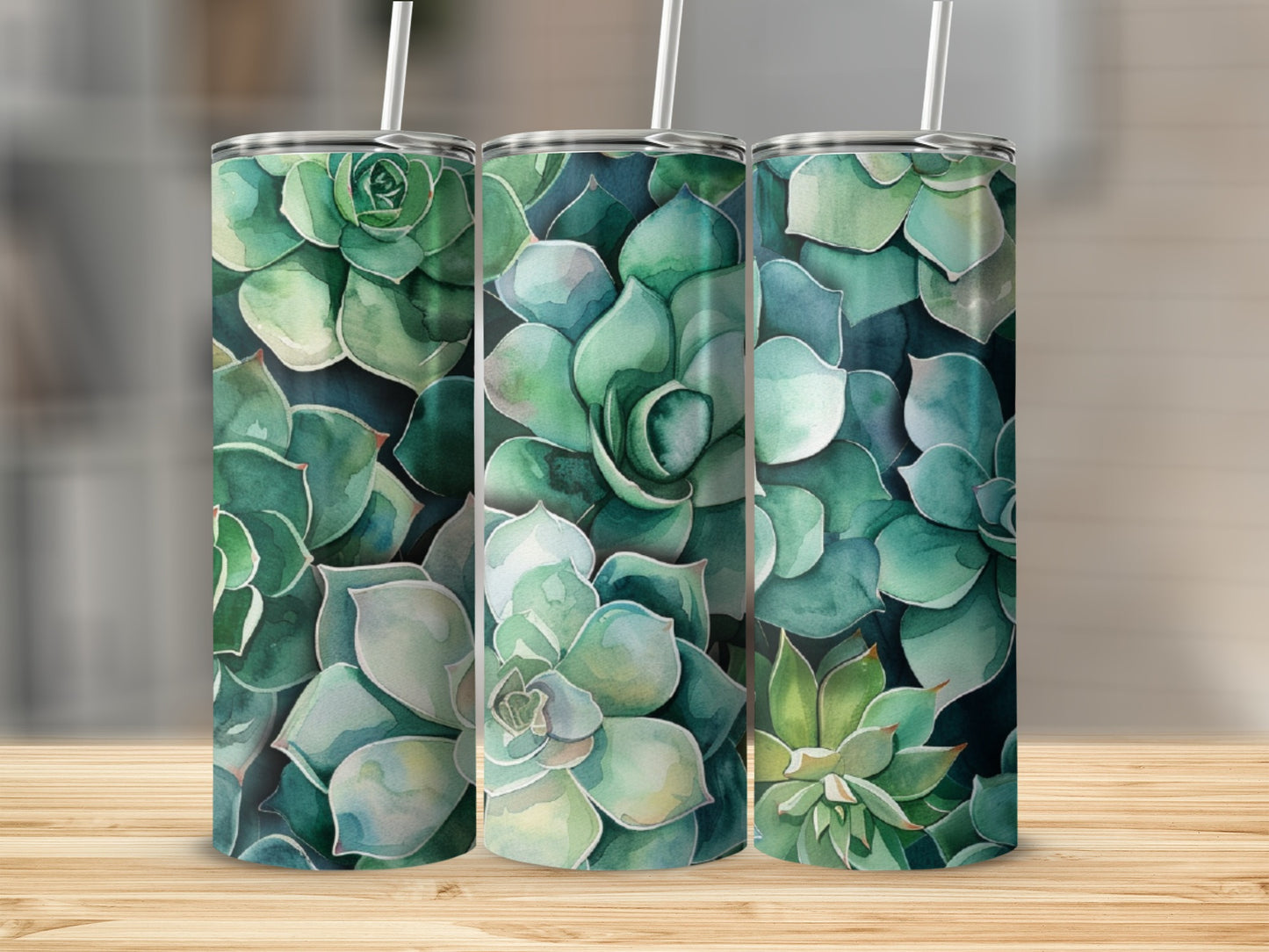 Three tumblers featuring a watercolor succulent pattern.