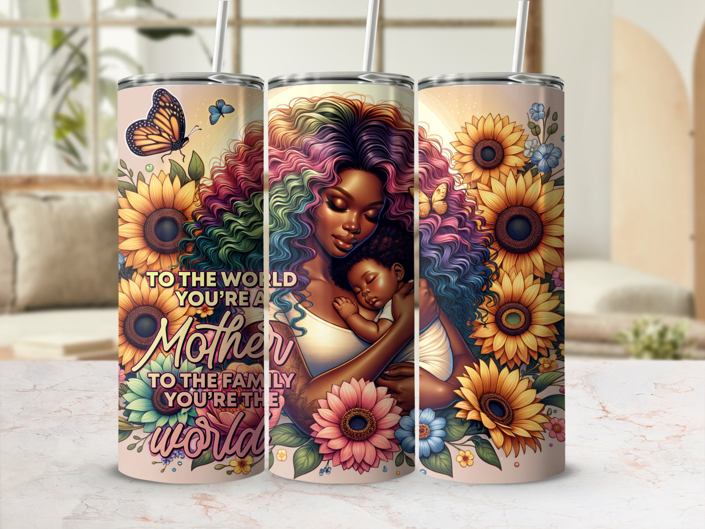 Woman holding baby with sunflowers and butterfly design.