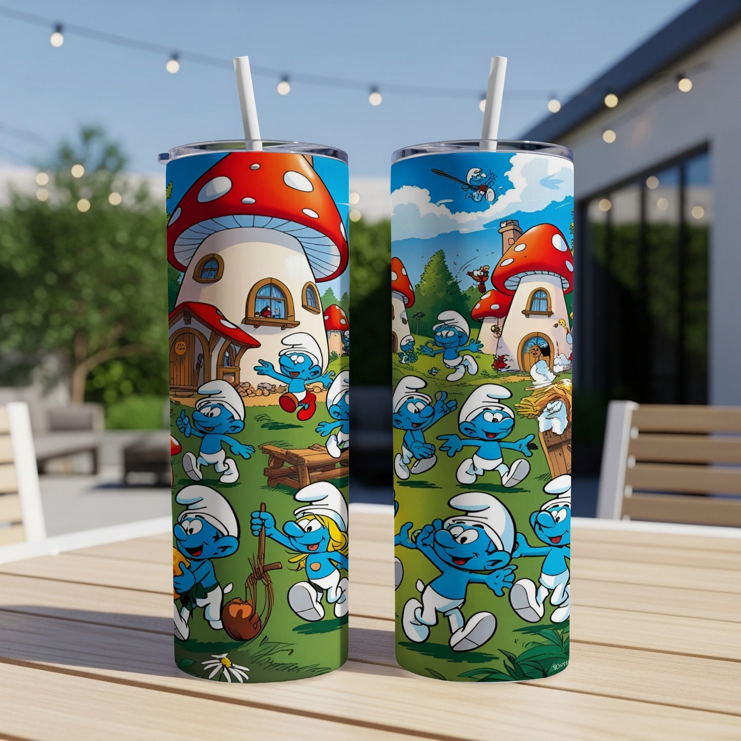 Smurfs playing in front of mushroom houses on a cylindrical tumbler.