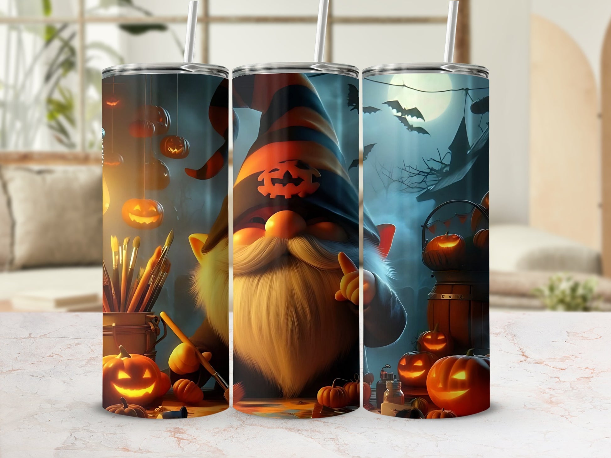Three tumblers with Halloween gnome and pumpkin designs.